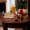 Christmas Toys Santa v křesle s hracím mechanismem, 15 x 10 cm